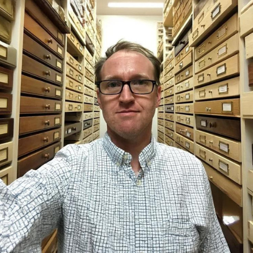 Photo of Dr. Jason Gibbs in a sample collection room.